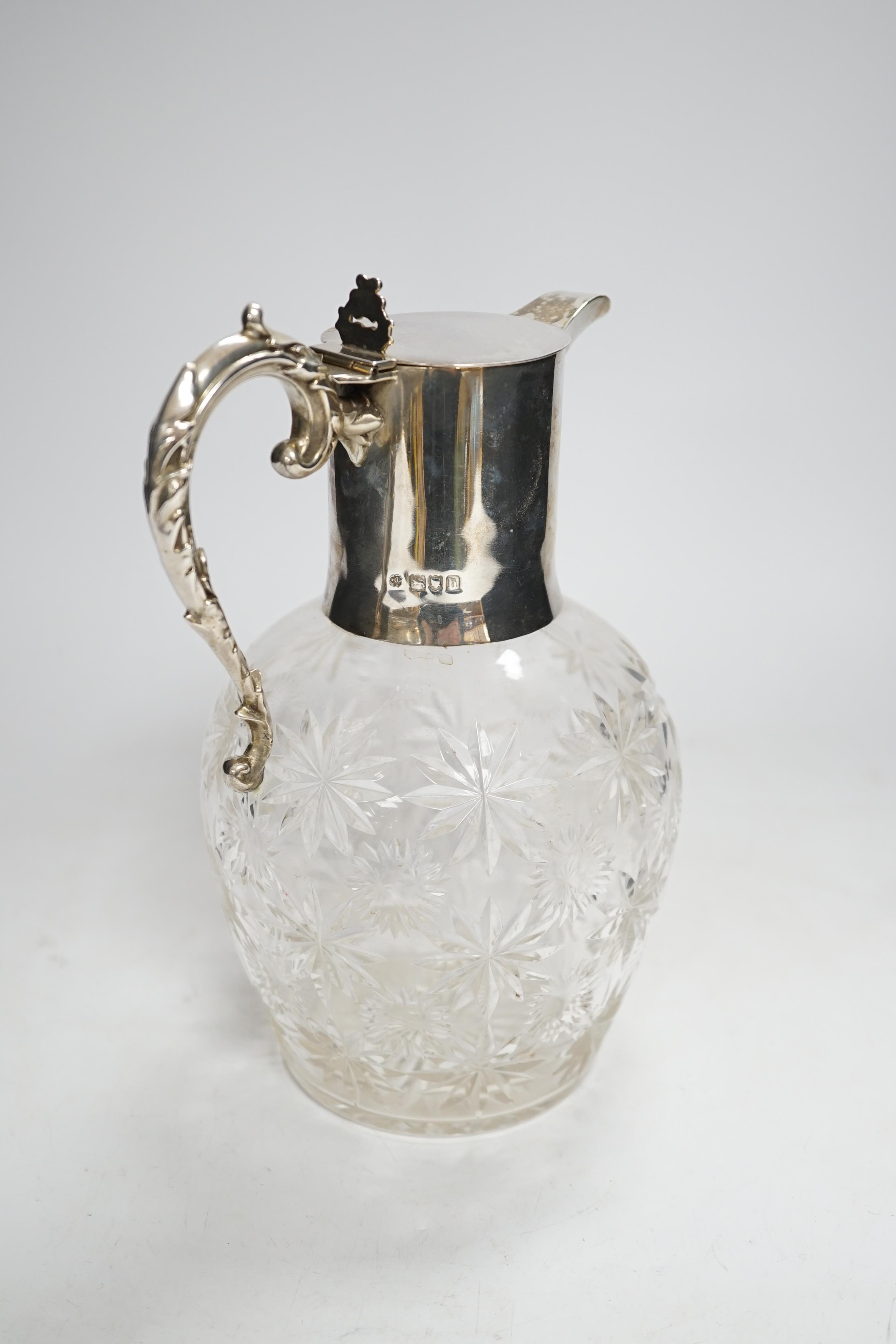 An Edwardian silver mounted cut glass claret jug, William Hutton & Sons, London, 1903, 21.8cm.